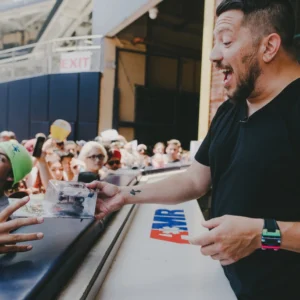 Impractically Speaking Live Sal handing out figures