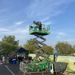 Two Friends BBL camera operator on lift