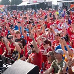 KC tailgate crowd arms raised
