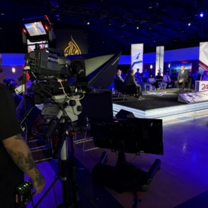 Al Jazeera camera operator side view