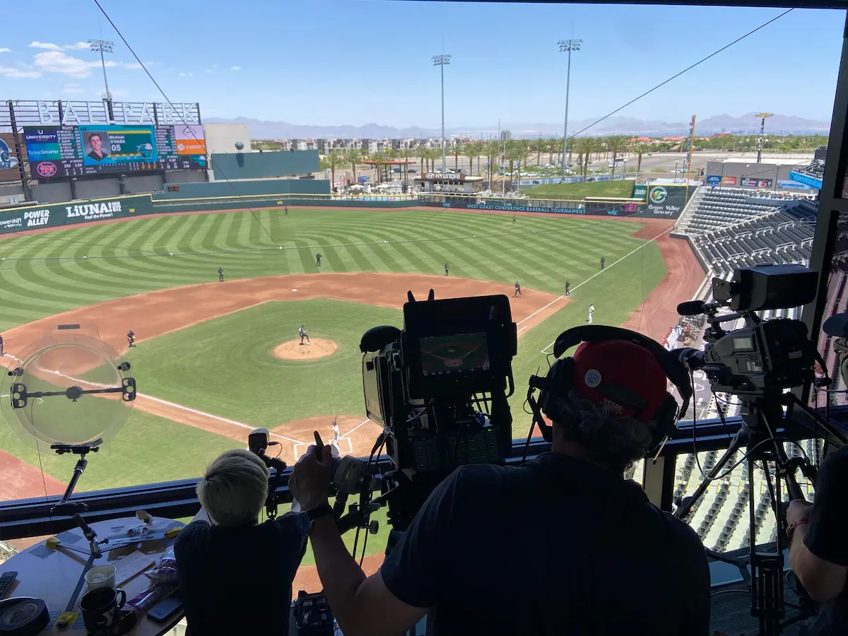 Camera Man at Baseball Game