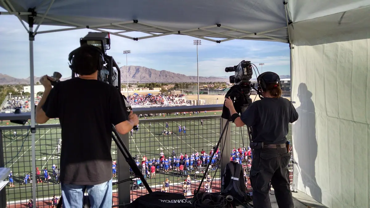 Camera Men at Football Game